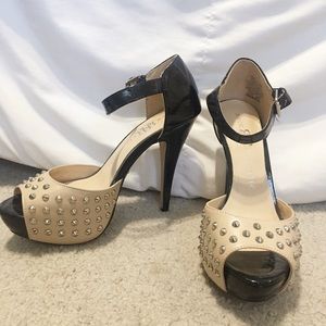 Peep-toe black and cream/tan studded heels